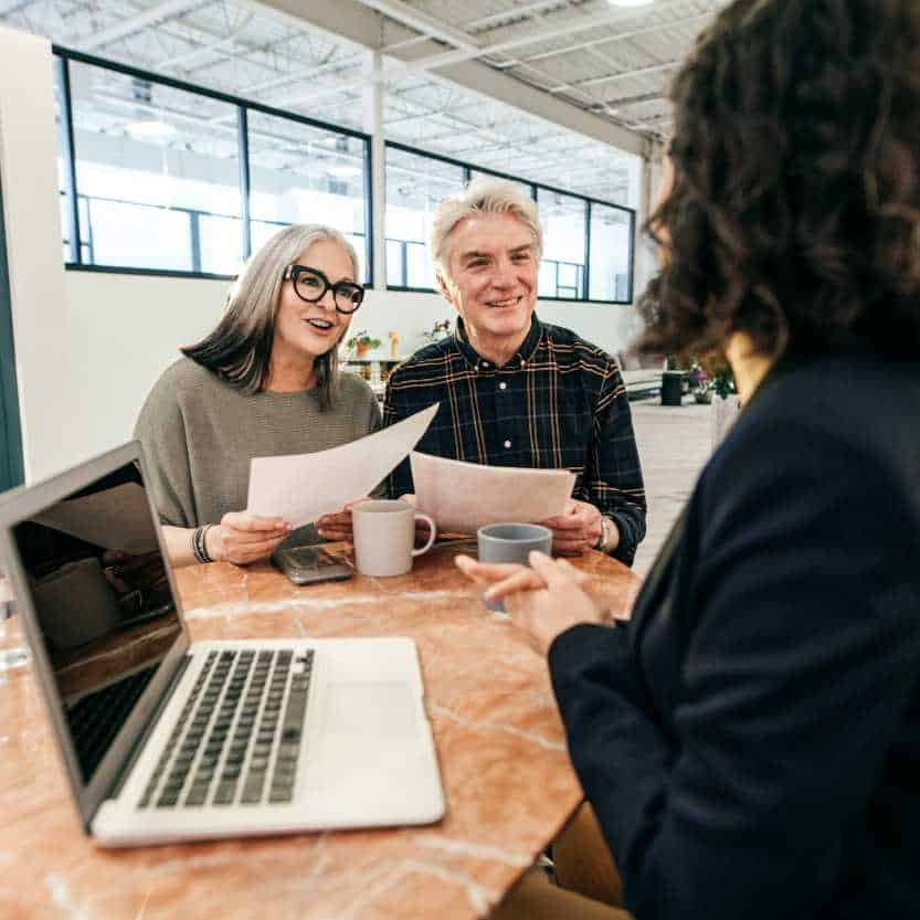 : Individual drafting a will online at home, showcasing the benefits of digital Will writing services {name}.